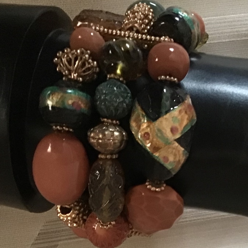 Statement chunky style beaded bracelet with gold color accents